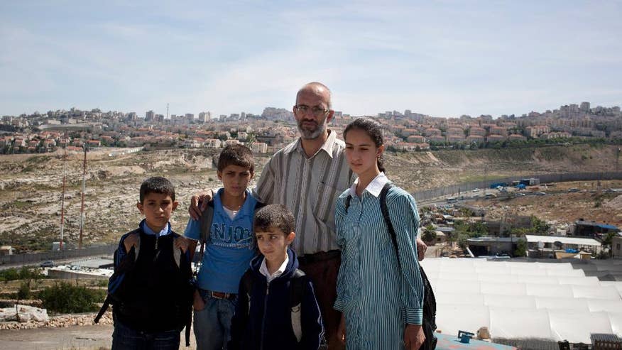 Mideast Palestinians Divided Family-1.jpg